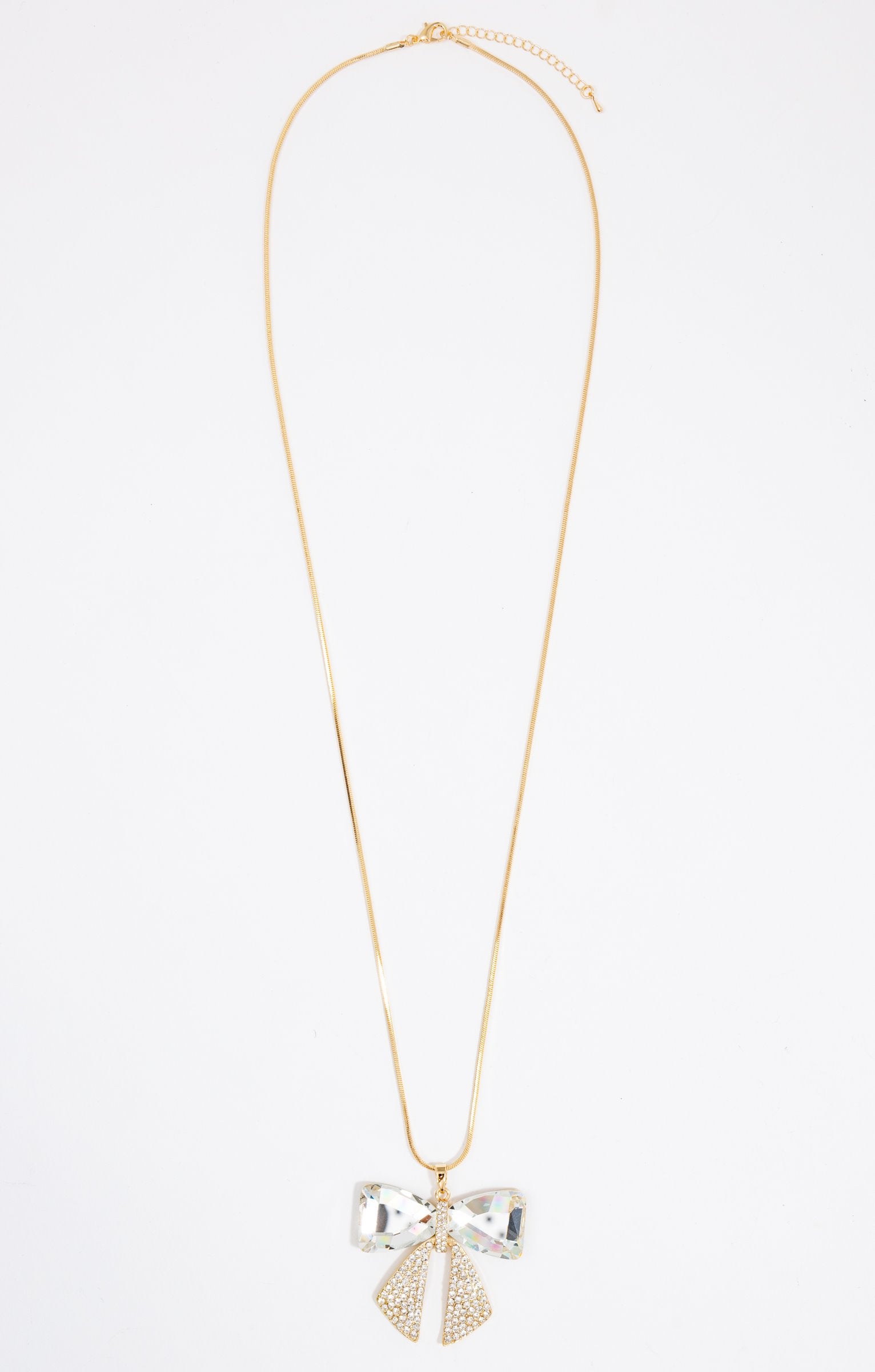 Collier sautoir avec pendentif nœud élégant