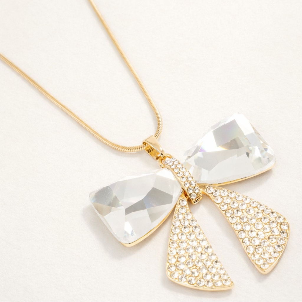 Collier sautoir avec pendentif nœud élégant