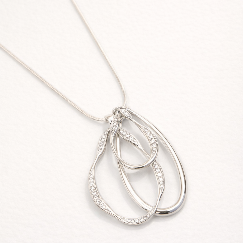 Collier long sautoir pendentif goutte ornée de strass